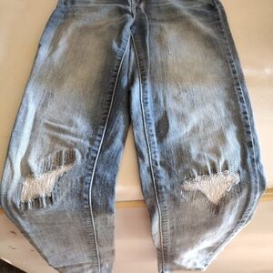 Distressed Blue Jeans